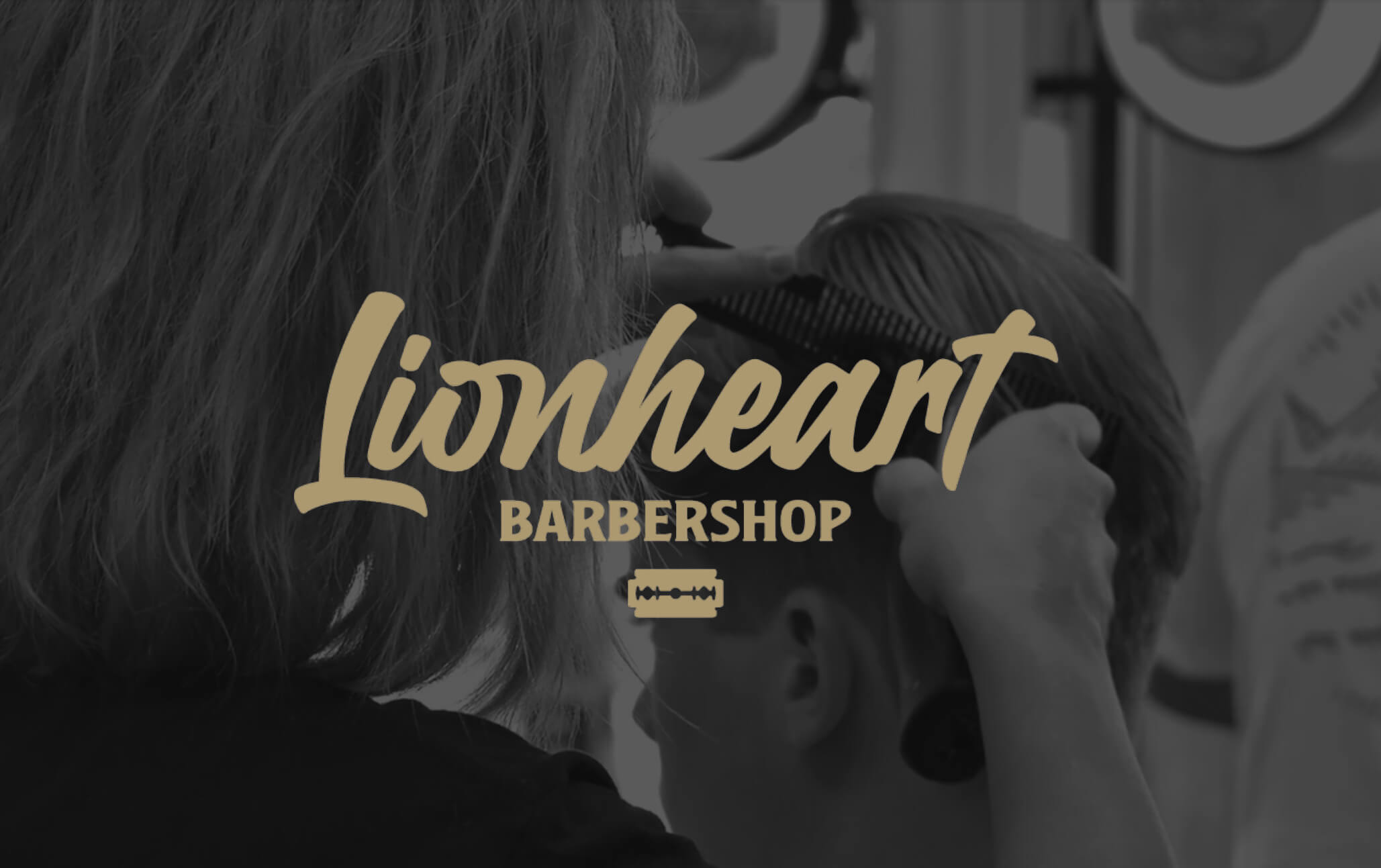 Lady cutting boys hair with lionheart barbershop written over the top