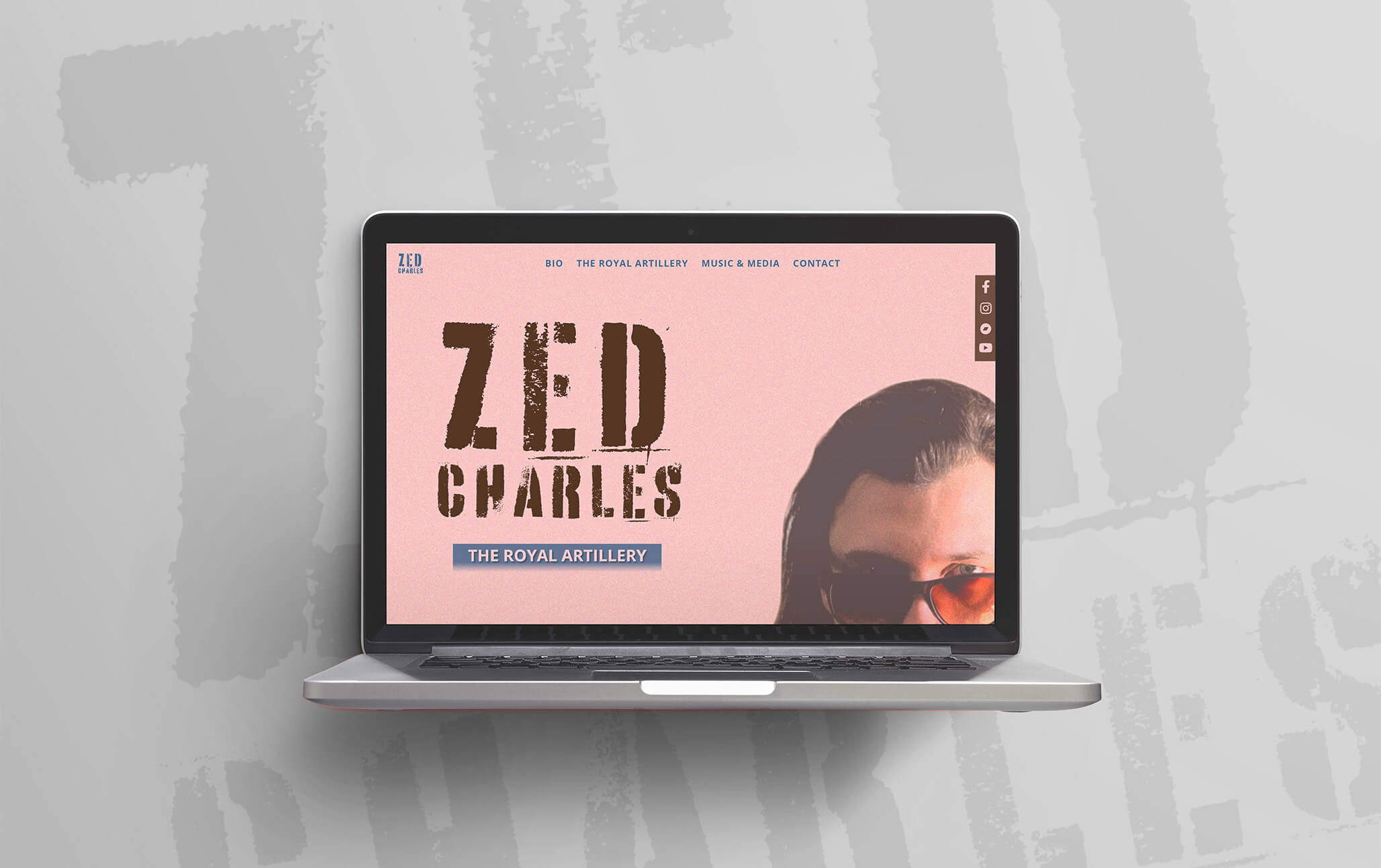 Zed Charles website displayed on laptop